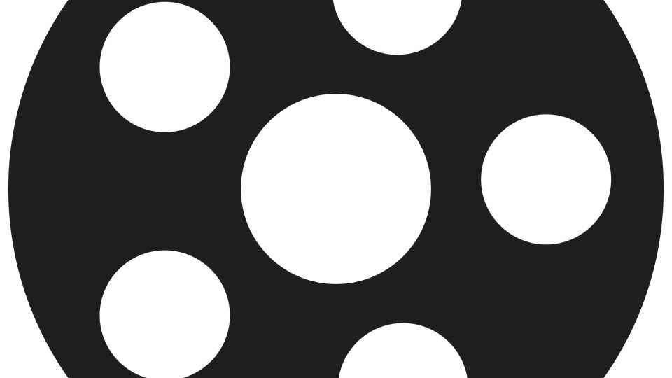 Black circular film reel icon with five evenly spaced round holes around a larger central hole on a white background.